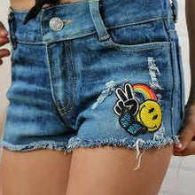 Load image into Gallery viewer, BUTTERFLY + PEACE SMILEY FACE RAINBOW PATCH DENIM SHORTS
